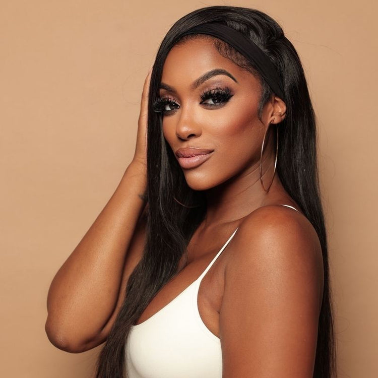 Porsha wearing a side part in the straight headband wig 